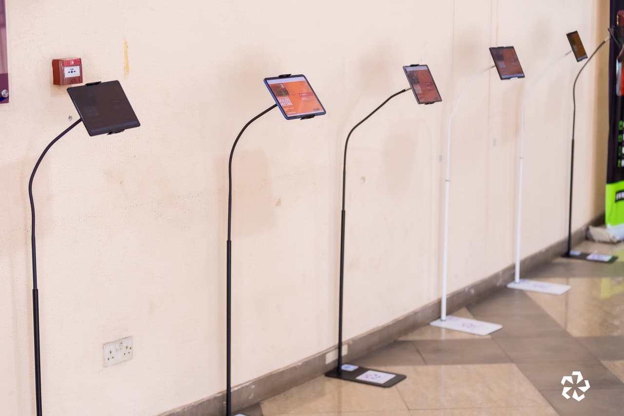Onsite event registration desk with badge printing at corporate event in Ghana: Asterixify digital registration system