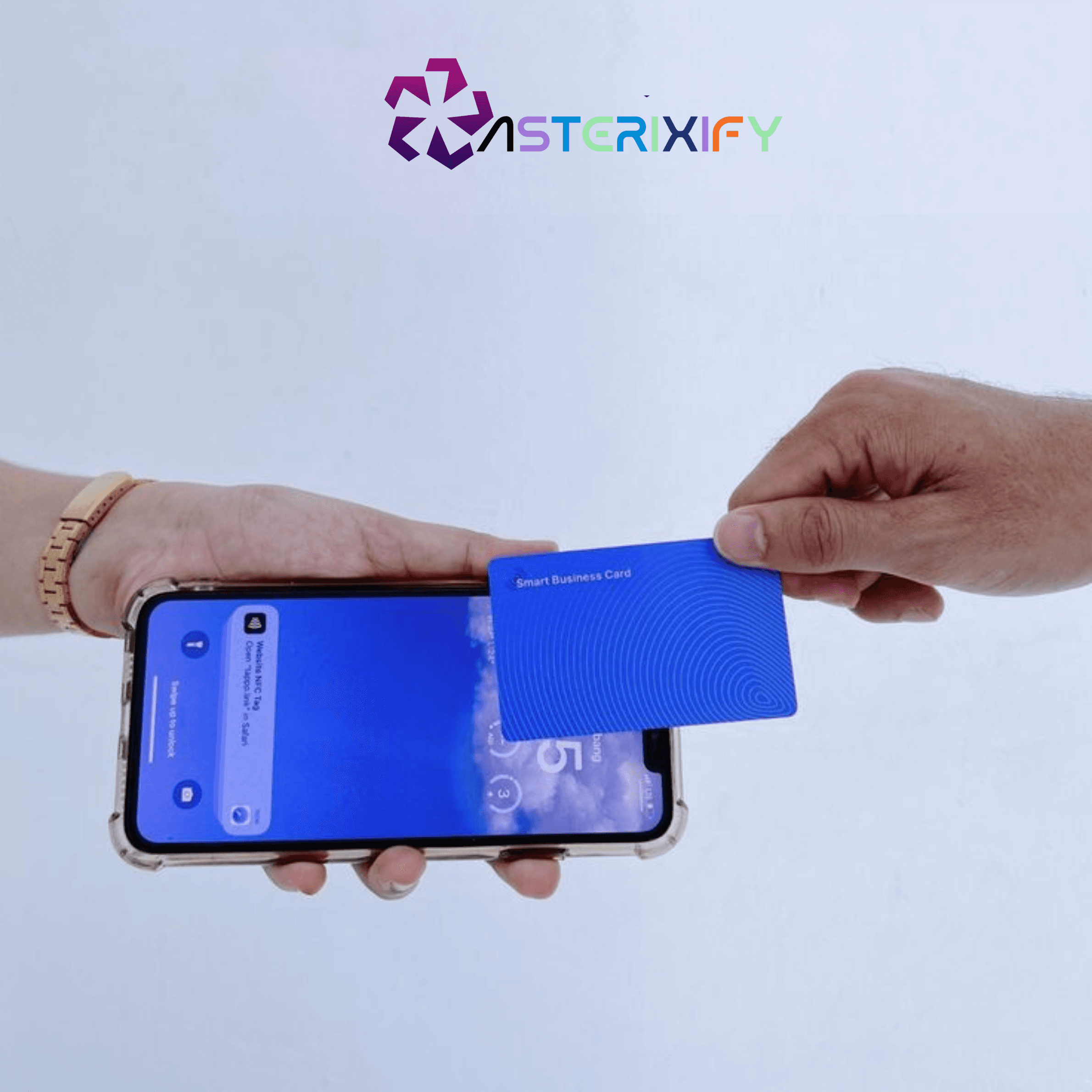 Asterixify blue NFC smart card tapping phone — instant contact sharing across Ghana