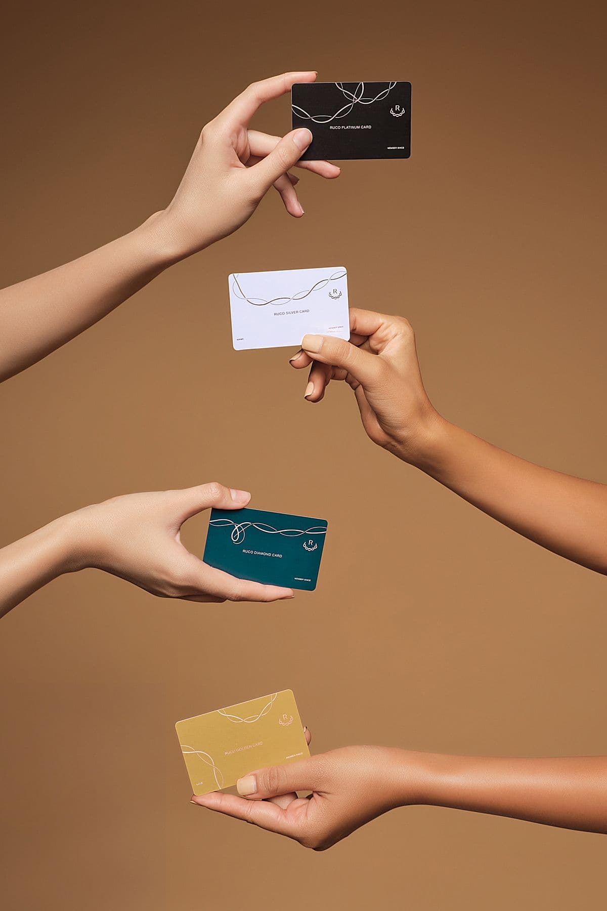 Premium NFC cards in multiple finishes — black, white, teal and gold